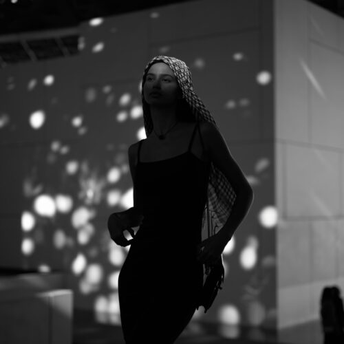 Model in dramatic spotlight